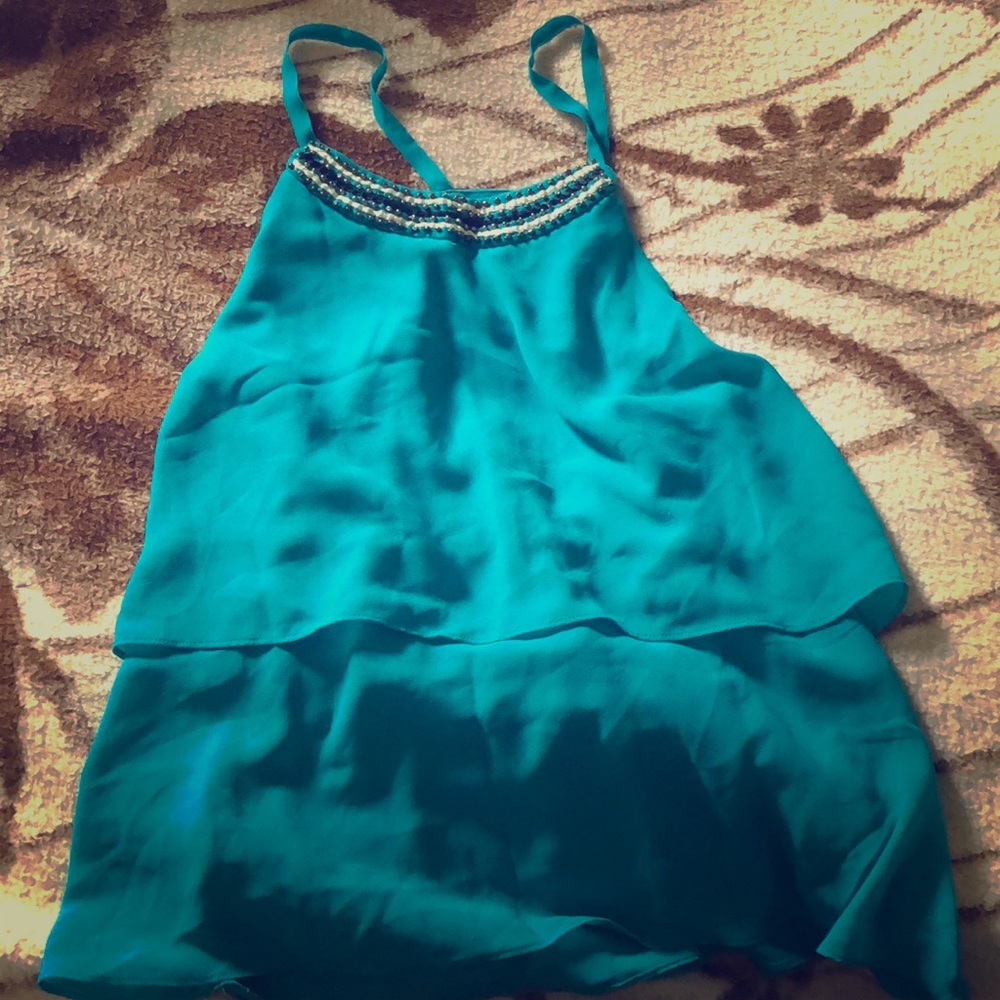 A little blue tank top